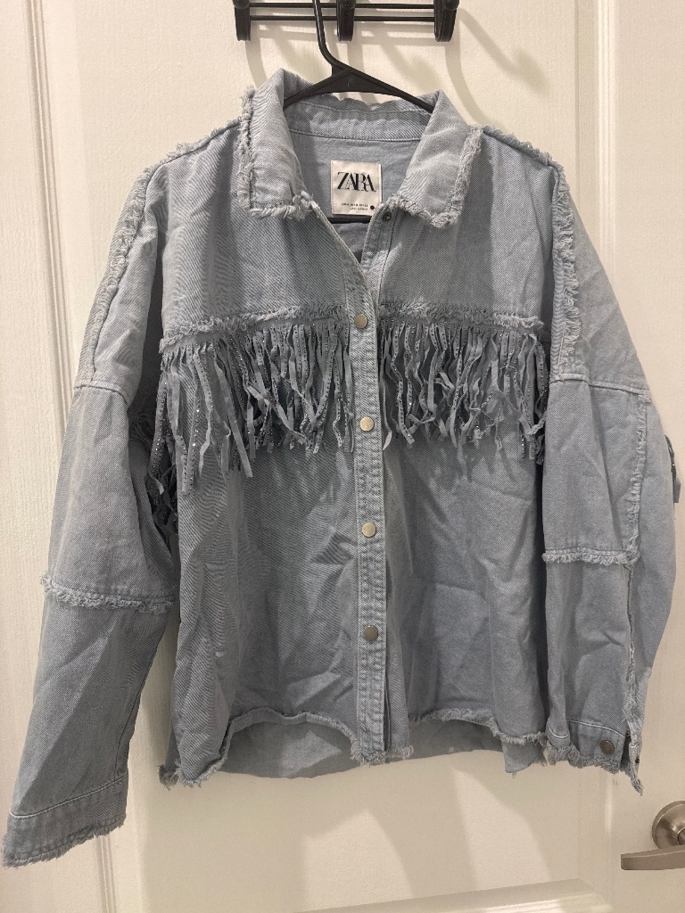 Blue denim jacket with reflective beads